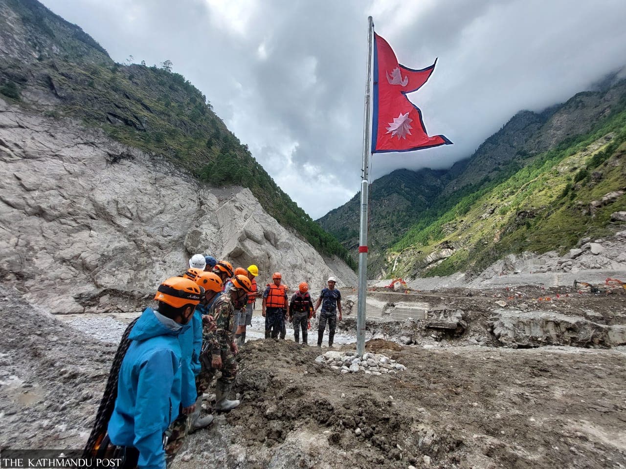 Security personnel install Nepali flag on the border with China in Rasuwagadhi
